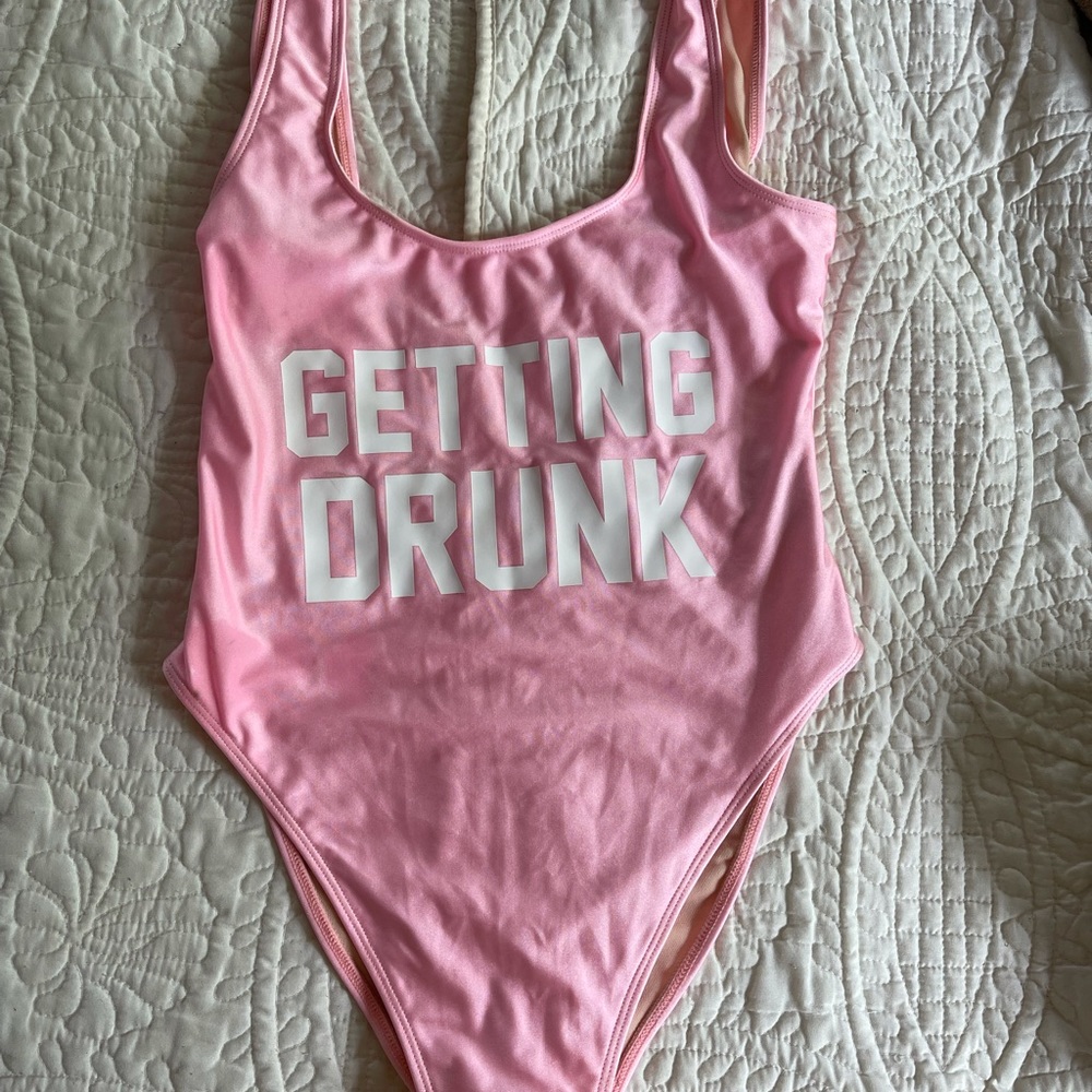 Private party M/L one piece. Bought for a bachelorette party and never wore.